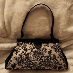 Sophisticated Patricia Nash Frame hand held handbag / purse